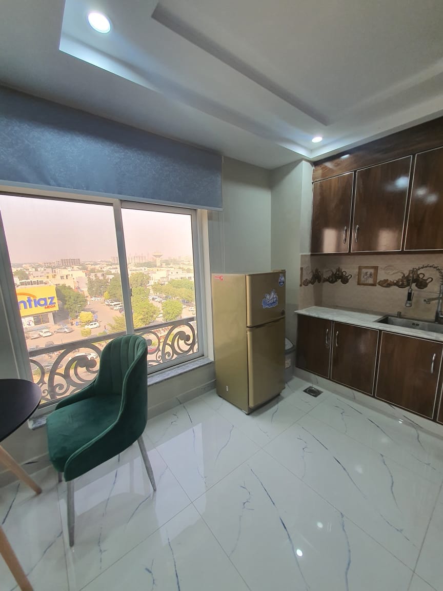 Single bed Brand New Apartment For Sale In Sector-E Quaid commercial block Bahria town Lahore