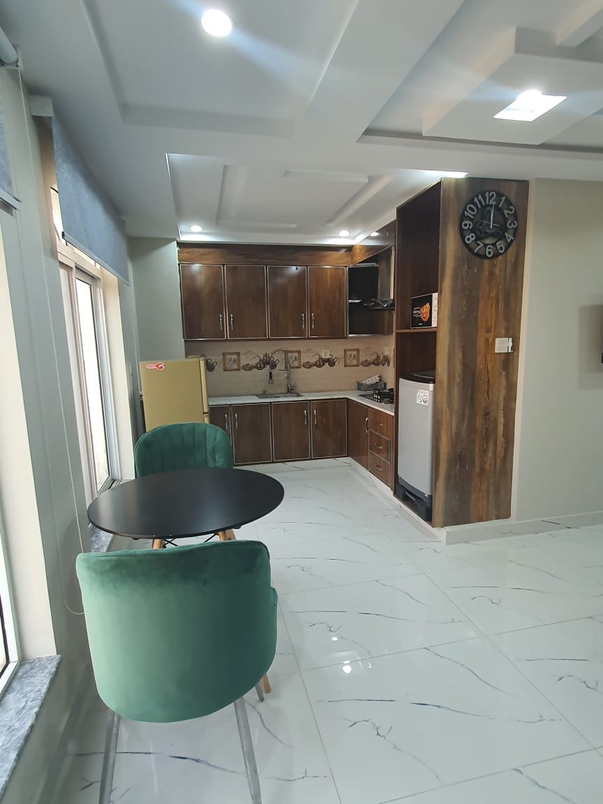 Single bed Brand New Apartment For Sale In Sector-E Quaid commercial block Bahria town Lahore