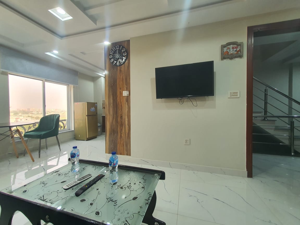 Single bed Brand New Apartment For Sale In Sector-E Quaid commercial block Bahria town Lahore