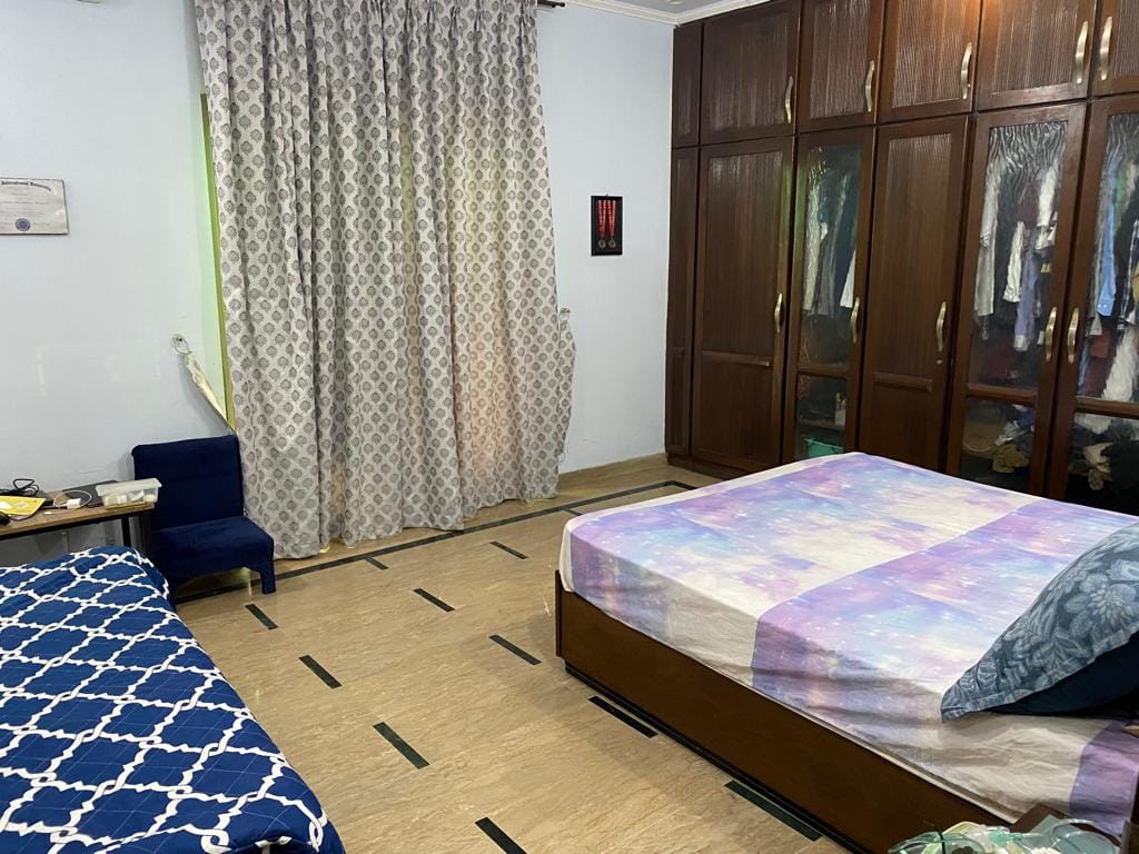 1 Kanal double-story house for sale 10 years used marble flooring in Wapda Town Phase 1 Lahore