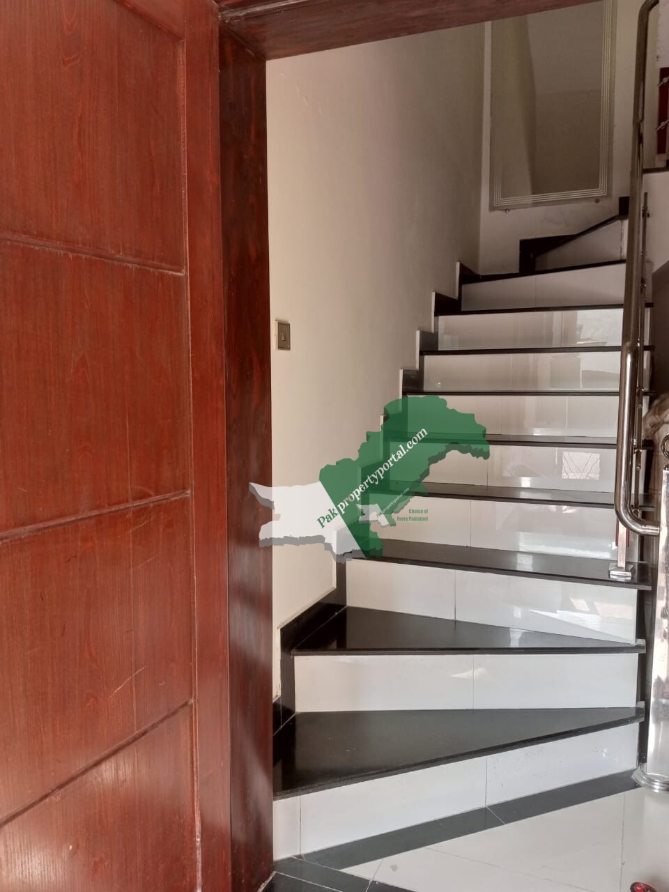 5 Marla house for sale In the center of sector D Bahria town Lahore