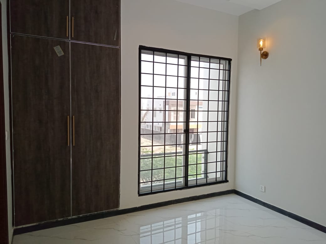 10 Marla brand new house available for rent Sector F Bahria Town Lahore